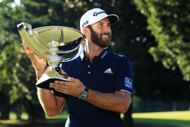 Dustin Johnson poses after winning the 2020 Tour Championship